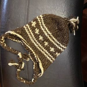 Very warm, handmade knitted hat. Brand new, original design.